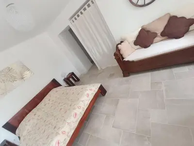 Un ou plusieurs lits dans un hébergement de l'établissement Maison de charme proche Bastia