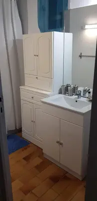 Cuisine ou kitchenette dans l'établissement Charmant T3 en rez de jardin d'une villa