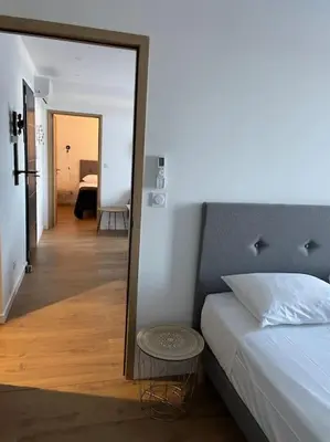 Un ou plusieurs lits dans un hébergement de l'établissement Appartement F3 Corte, centre ville