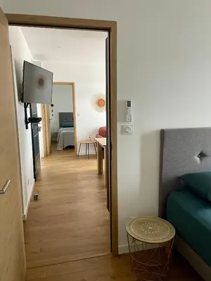 Un ou plusieurs lits dans un hébergement de l'établissement Appartement F3 Corte, centre ville