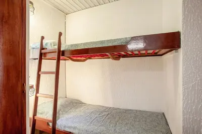 Un ou plusieurs lits dans un hébergement de l'établissement U Prato - Bungalow proche de la mer
