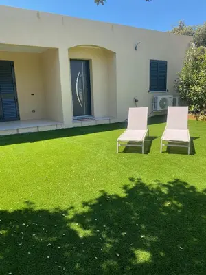 Jardin de l'établissement Villa CALLINAJO , à 1 min de la plage LOZARI