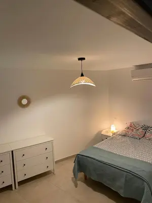 Un ou plusieurs lits dans un hébergement de l'établissement Villa CALLINAJO , à 1 min de la plage LOZARI