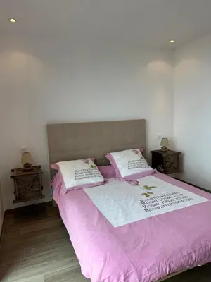 Un ou plusieurs lits dans un hébergement de l'établissement Appartement Cardo