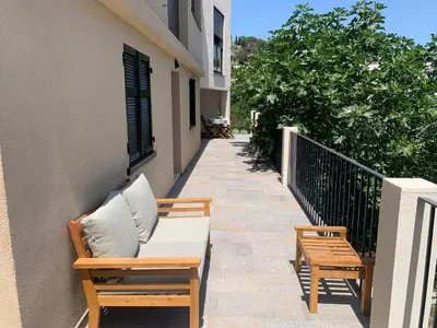 Balcon ou terrasse dans l'établissement Rez de villa avec terrasse vue mer