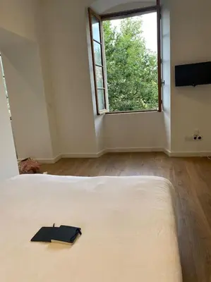 Un ou plusieurs lits dans un hébergement de l'établissement Place Saint Nicolas - Centre Ville Bastia