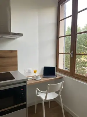 Cuisine ou kitchenette dans l'établissement Place Saint Nicolas - Centre Ville Bastia