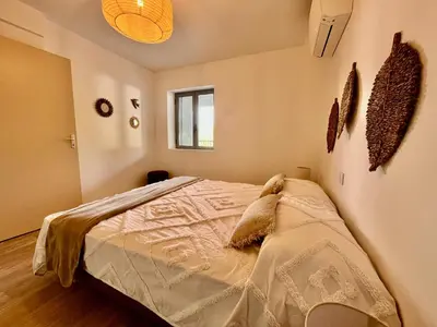 Un ou plusieurs lits dans un hébergement de l'établissement Hôtel Résidence CAPENSE