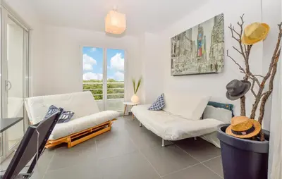 Coin salon dans l'établissement Amazing Home In Pigna With Kitchen