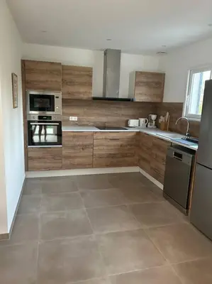 Cuisine ou kitchenette dans l'établissement Villa mina