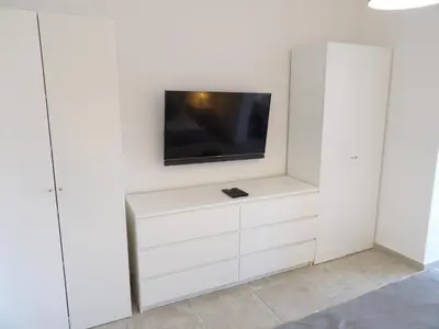 Télévision ou salle de divertissement dans l'établissement Villa de standing