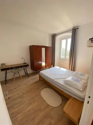 Un ou plusieurs lits dans un hébergement de l'établissement Corte magnifique T2 45m2 neuf 5 personnes place st marcel hyper centre wifi lave linge tv