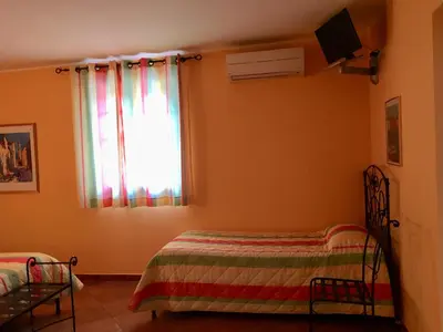 Un ou plusieurs lits dans un hébergement de l'établissement Hotel Du Vignoble