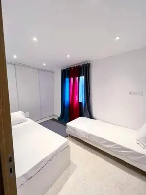 Un ou plusieurs lits dans un hébergement de l'établissement Maison centre-ville