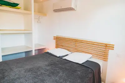 Un ou plusieurs lits dans un hébergement de l'établissement Residence Villa Branda