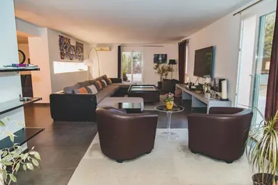 Coin salon dans l'établissement Residence Villa Branda