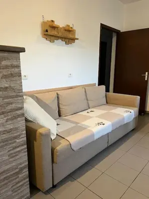 Coin salon dans l'établissement Appartement 90 m2 proche de Corte