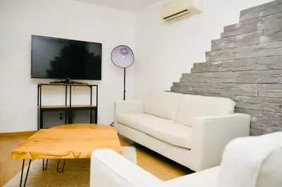 Télévision ou salle de divertissement dans l'établissement Casa Serena
