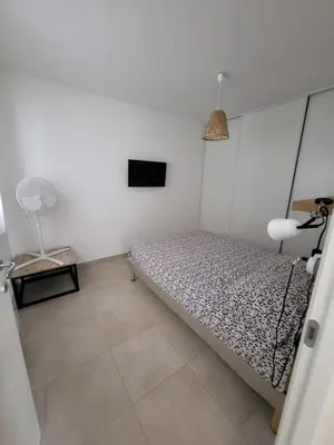 Un ou plusieurs lits dans un hébergement de l'établissement Residence Marina di Bravone