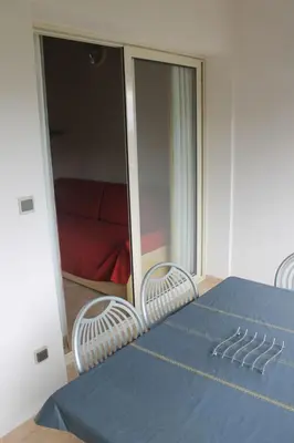 Un ou plusieurs lits dans un hébergement de l'établissement Appartamento con 2 camere da letto a 200 m dalla spiaggia