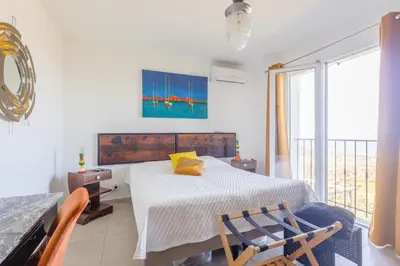 Un ou plusieurs lits dans un hébergement de l'établissement A Casa Praoli - Coin de paradis vue mer