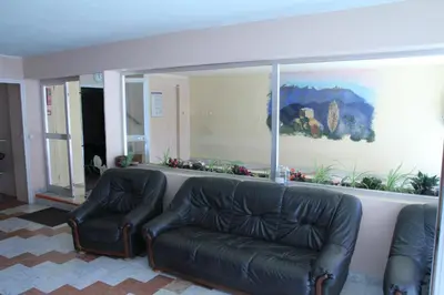 Coin salon dans l'établissement Hôtel Sampiero Corso