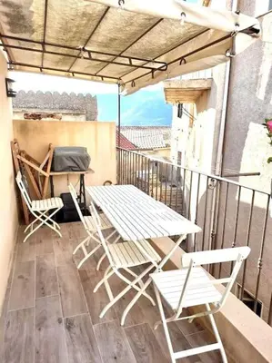 Balcon ou terrasse dans l'établissement Maison de village à 10 min d'Ile Rousse