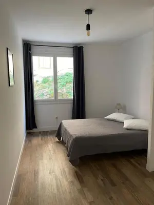 Un ou plusieurs lits dans un hébergement de l'établissement Appartement centre-ville