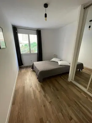 Un ou plusieurs lits dans un hébergement de l'établissement Appartement centre-ville