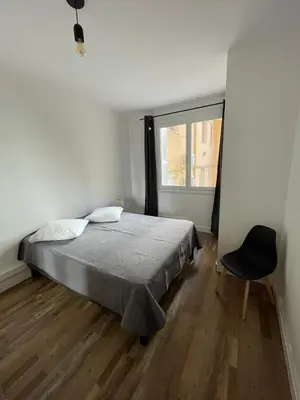 Un ou plusieurs lits dans un hébergement de l'établissement Appartement centre-ville
