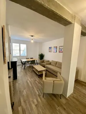 Coin salon dans l'établissement Appartement centre-ville