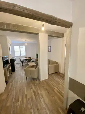Coin salon dans l'établissement Appartement centre-ville