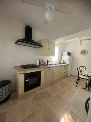 Cuisine ou kitchenette dans l'établissement casa