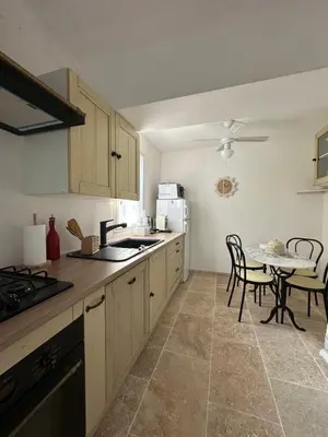 Cuisine ou kitchenette dans l'établissement casa