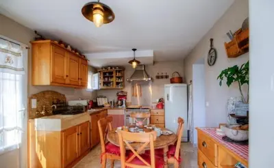 Cuisine ou kitchenette dans l'établissement A Stella
