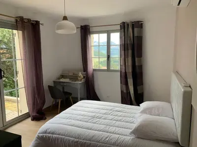 Un ou plusieurs lits dans un hébergement de l'établissement VILLA U TEMPIU CORSU