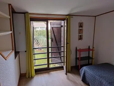Un ou plusieurs lits dans un hébergement de l'établissement Agréable villa 100 m de la plage