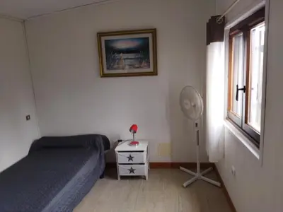 Un ou plusieurs lits dans un hébergement de l'établissement Agréable villa 100 m de la plage