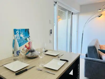 Coin salon dans l'établissement Appartement Aria Marina 1 Lumio