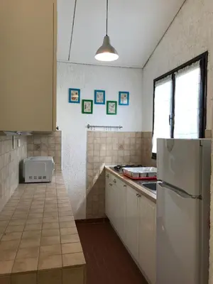 Cuisine ou kitchenette dans l'établissement Appartement T2 Solane 35 LUMIO