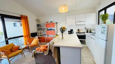 Cuisine ou kitchenette dans l'établissement Appartement T3 Solane 71 LUMIO