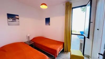 Un ou plusieurs lits dans un hébergement de l'établissement Appartement T3 Solane 71 LUMIO