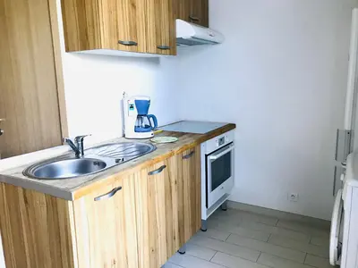 Cuisine ou kitchenette dans l'établissement Studio 26 VAC Lumio