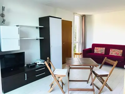 Cuisine ou kitchenette dans l'établissement Studio 26 VAC Lumio