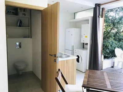 Cuisine ou kitchenette dans l'établissement Studio 26 VAC Lumio