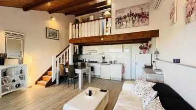 Cuisine ou kitchenette dans l'établissement Appartement T3 Boug 15 LUMIO