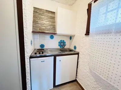 Cuisine ou kitchenette dans l'établissement Studio Cocody 88 LUMIO