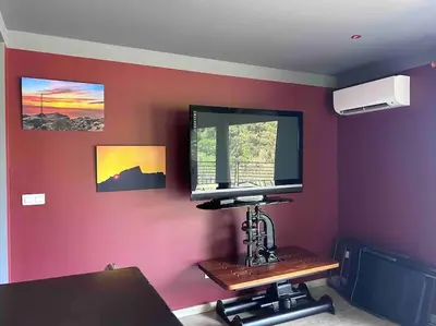 Télévision ou salle de divertissement dans l'établissement Villa de charme vue mer