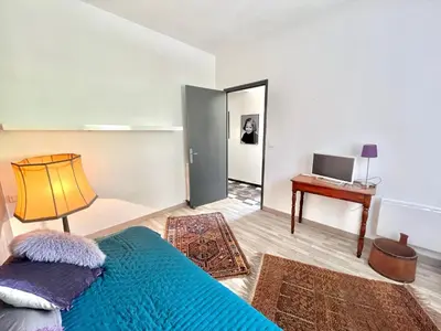 Un ou plusieurs lits dans un hébergement de l'établissement Appartement rez de villa CORTE