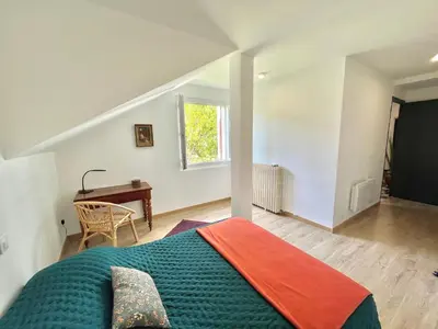 Un ou plusieurs lits dans un hébergement de l'établissement Appartement rez de villa CORTE